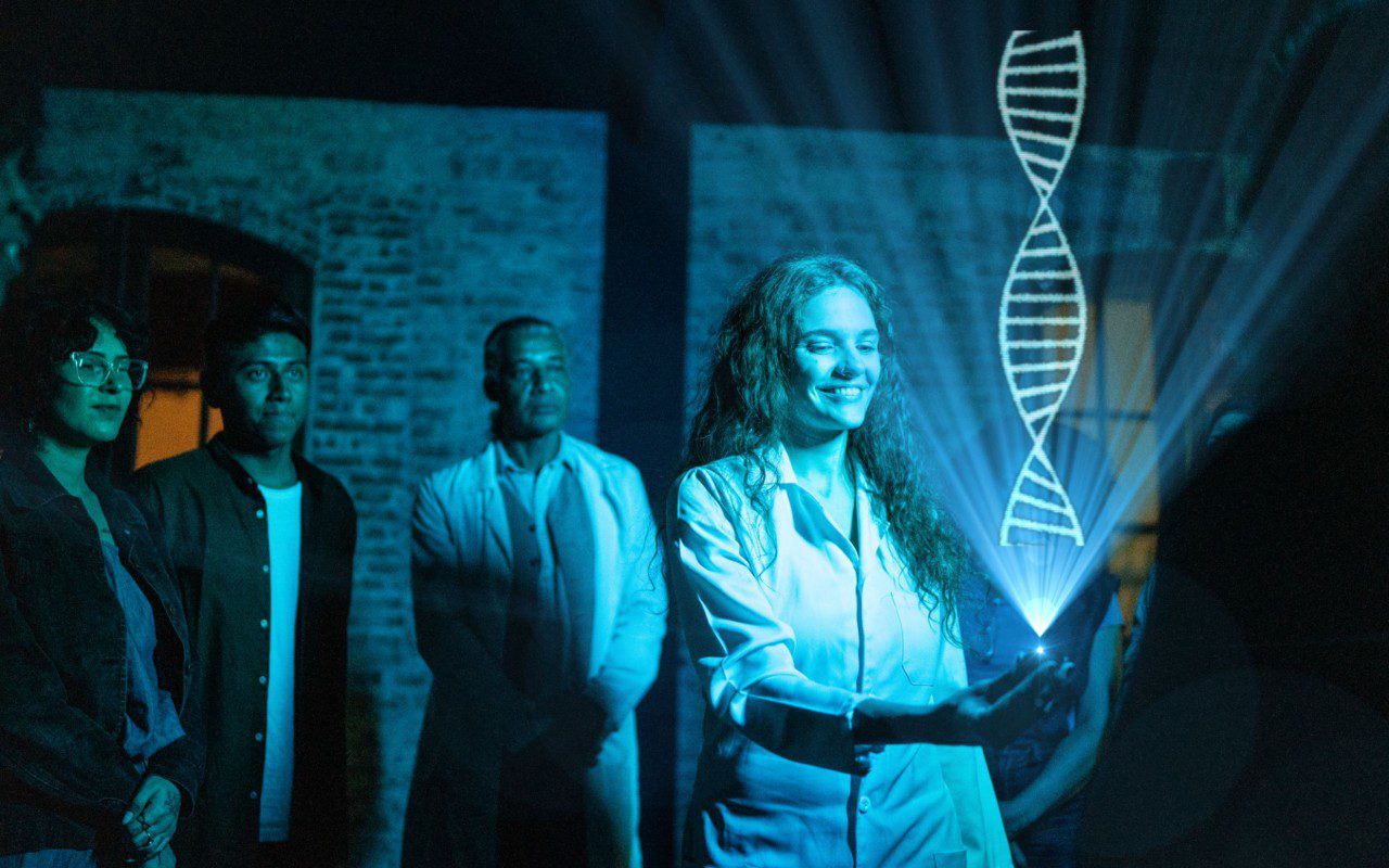 Person projecting holographic DNA image in room.